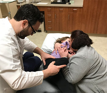 Sophia receiving medical care
